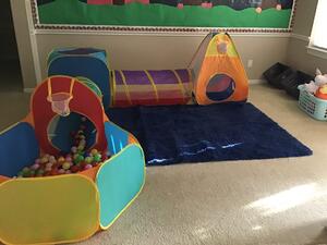 Image of a ball-pit and tube.