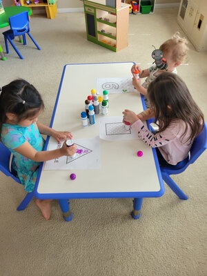 Three children at table
